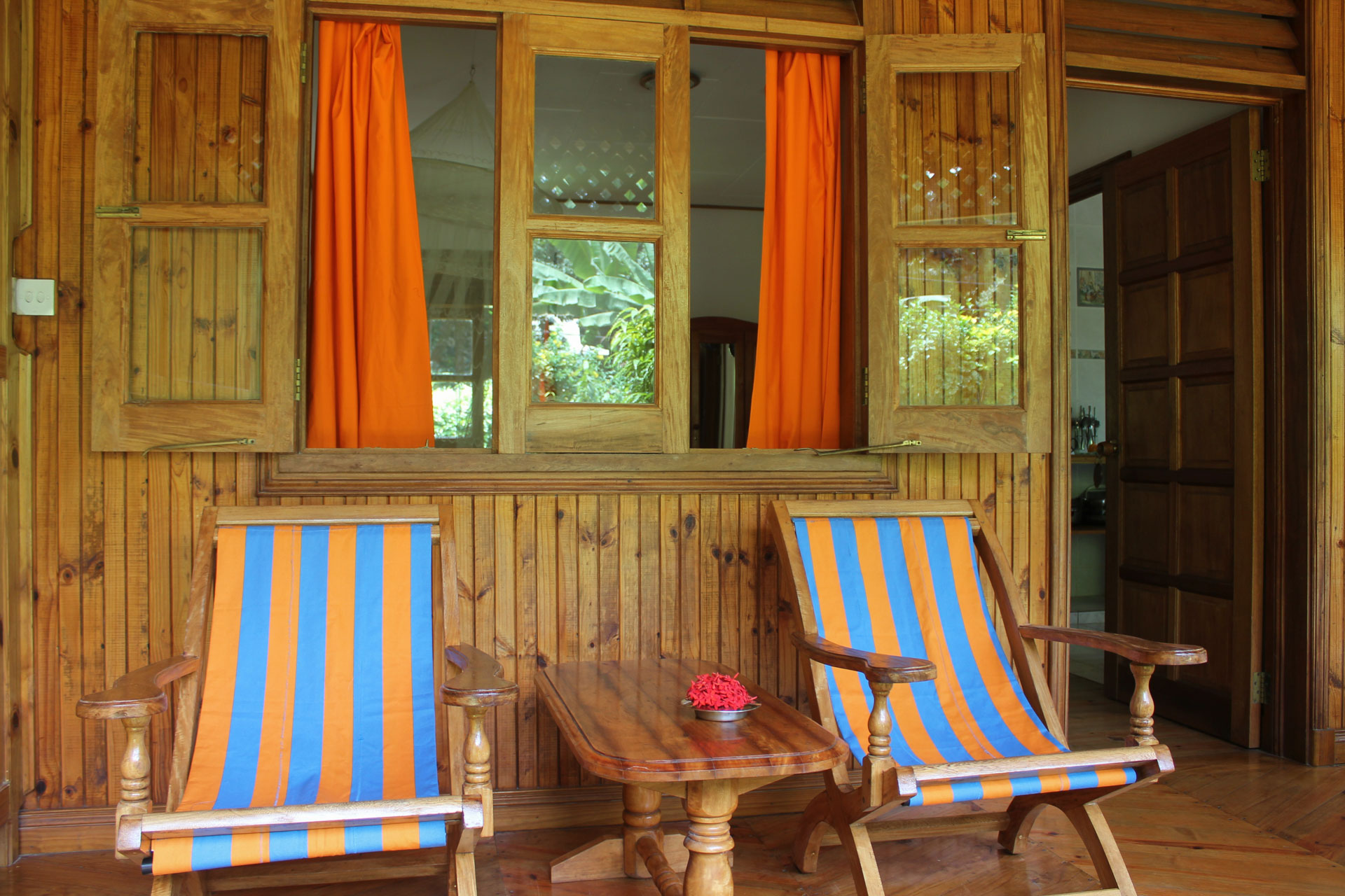 Veranda with reclining chairs made on the island